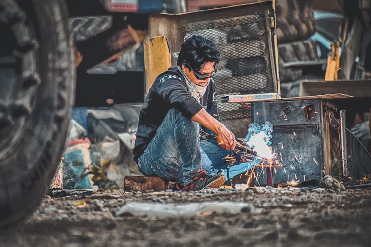 Photo Of Man Welding Metal