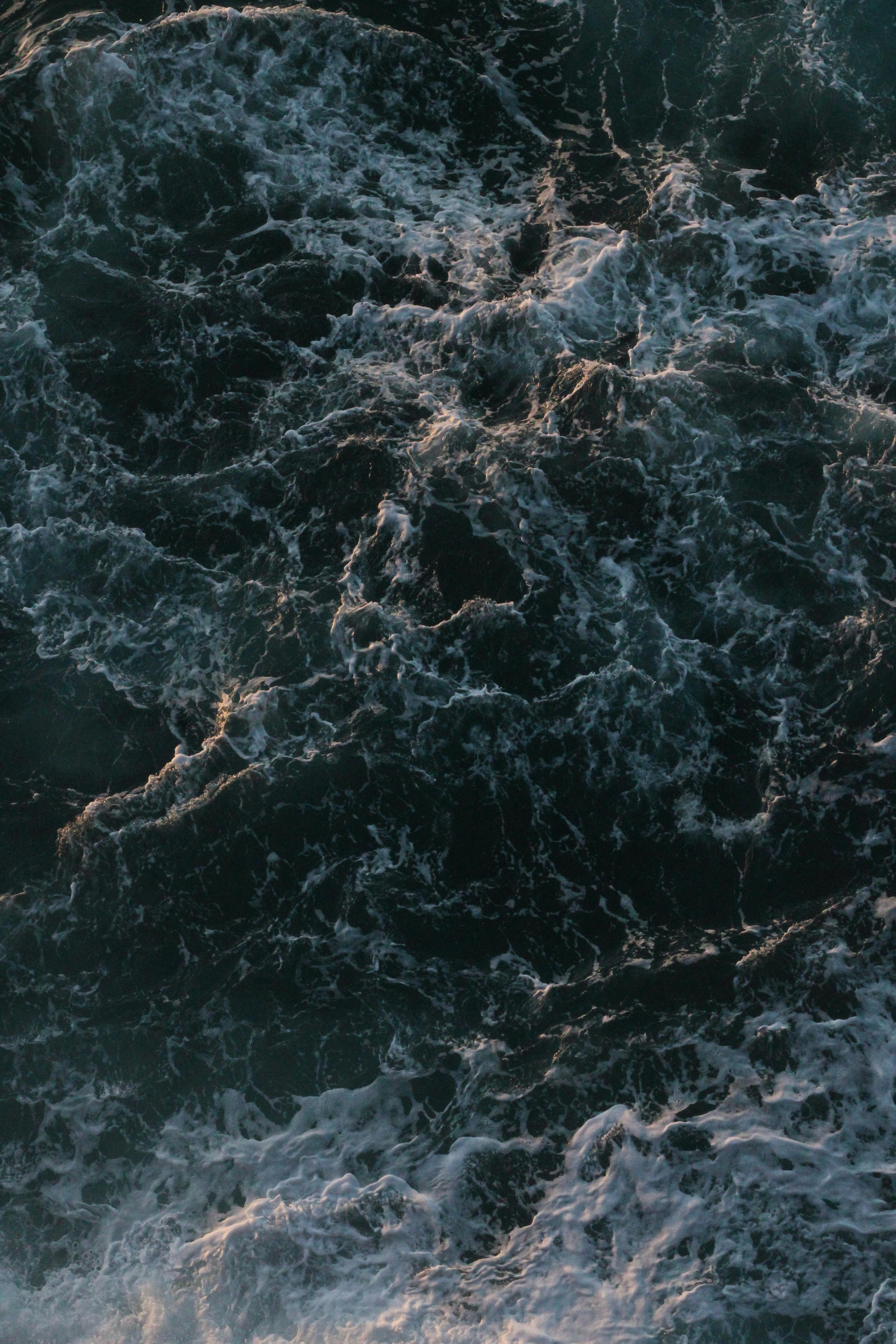 Dynamic ocean waves crashing create an artistic seascape in Peniche, Portugal.