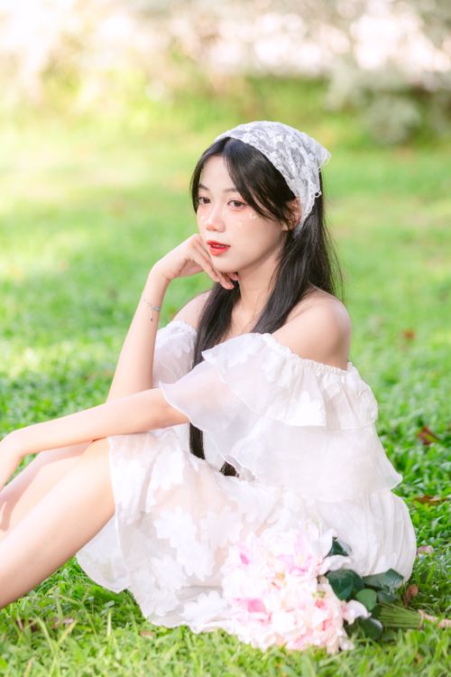 A woman in white dress posing for a photo · Free Stock Photo