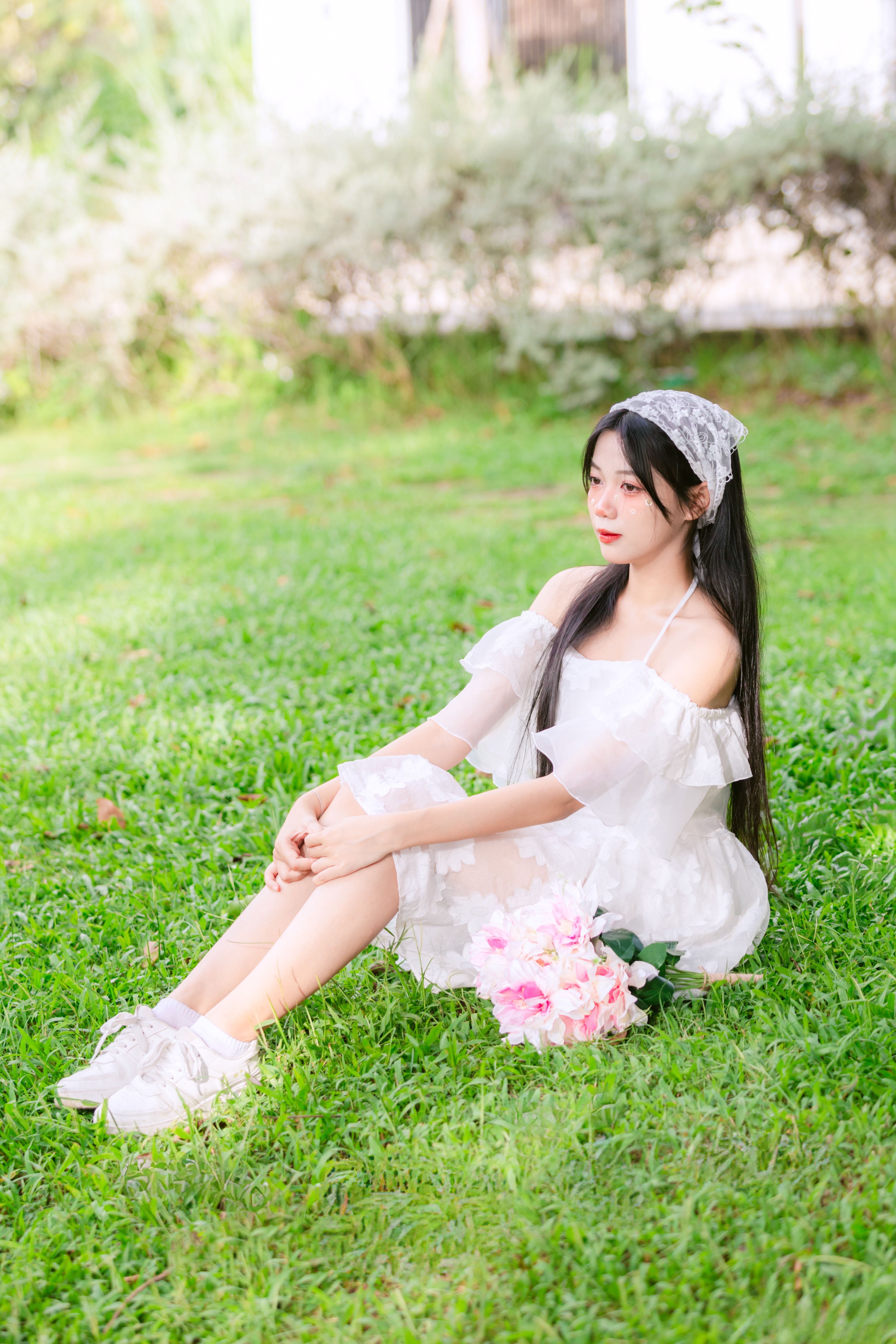A girl in white dress sitting on grass · Free Stock Photo