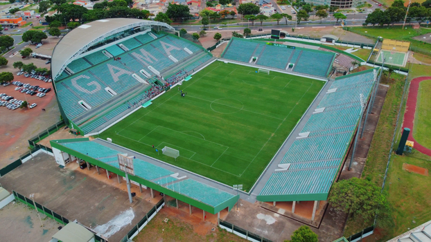 Aerial view of the Gama soccer stadium in Brasília, Brazil, showcasing the lush green field.