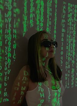 Portrait of a woman with projected digital code, showcasing cyberpunk style.
