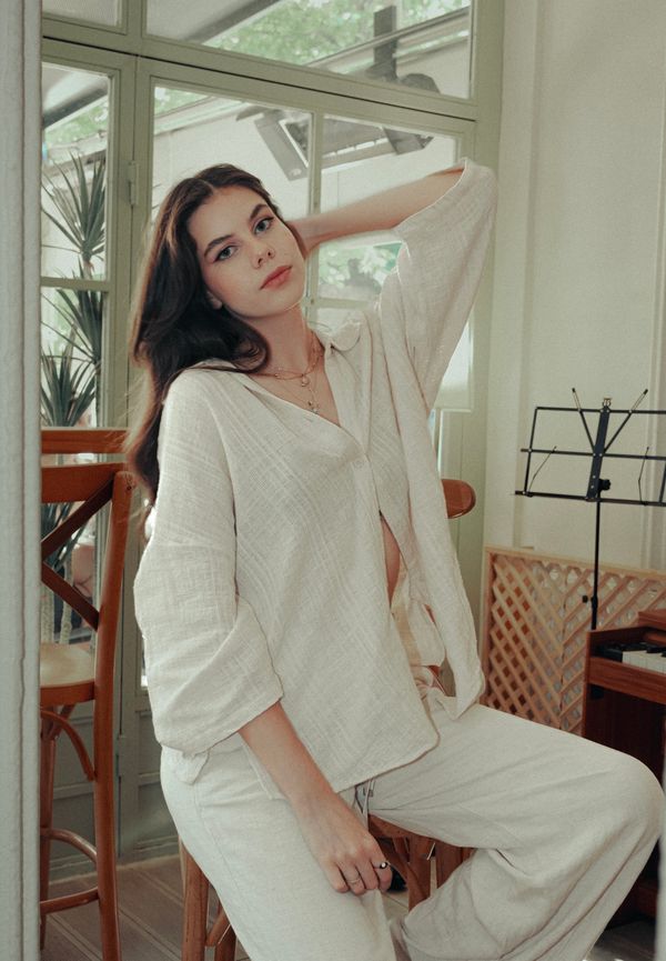Woman in wide leg linen pants with fitted top