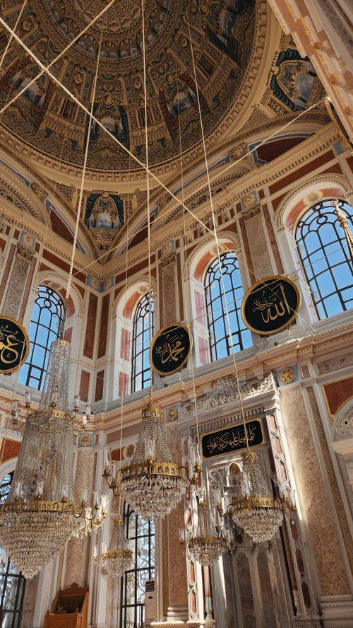 Free Explore the luxurious interior of Ortaköy Mosque, İstanbul, featuring stunning chandeliers and detailed ceiling mosaics. Stock Photo