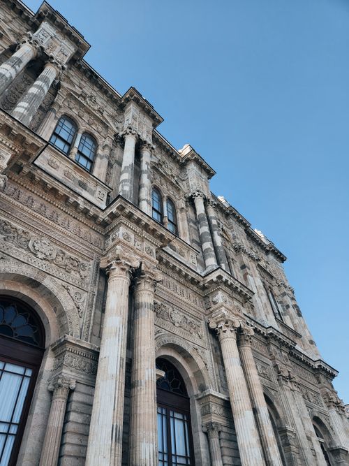 Free Stunning architectural details of the historic Dolmabahçe Palace in İstanbul, showcasing neoclassical design. Stock Photo