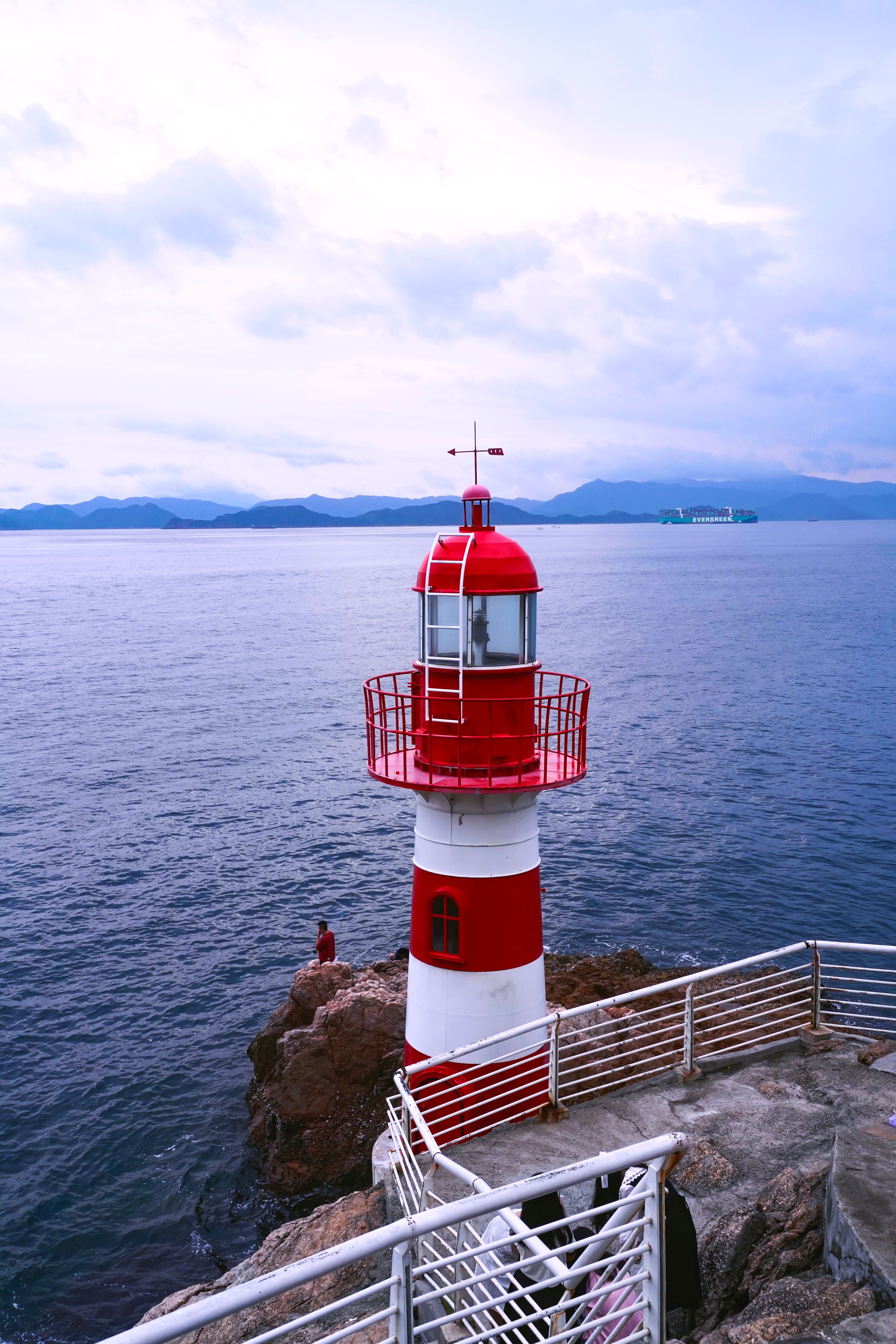 Red and white coastal lighthouse, Kerala