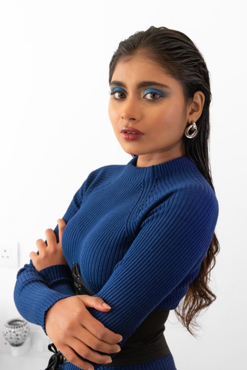 A woman in a blue dress posing for a photo · Free Stock Photo