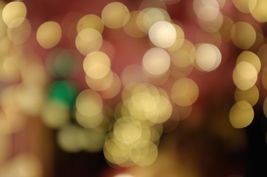 Golden bokeh lights creating a magical and festive atmosphere in Hanoi.