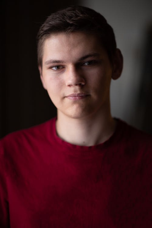 Free Men's Red Crew-neck Shirt Close-up Photography Stock Photo