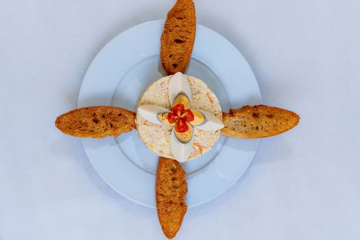 Stylish food presentation featuring bread slices and boiled eggs on a plate.