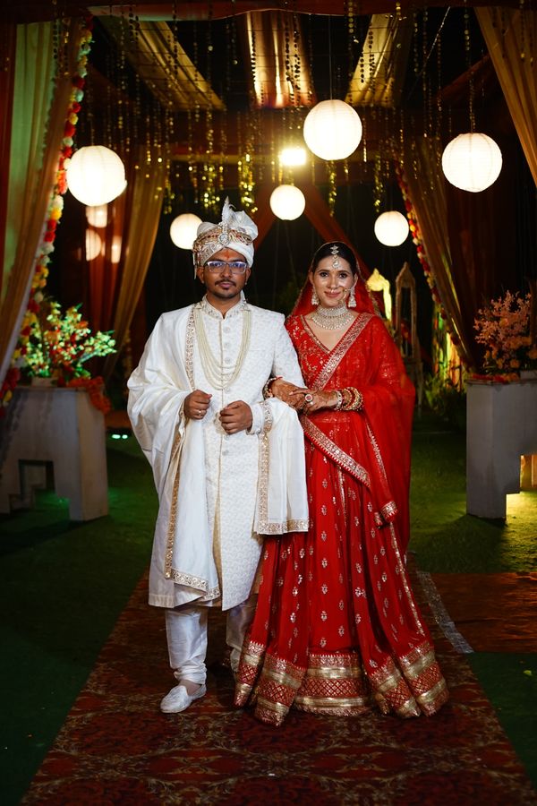 Elegant portrait of a couple in traditional Indian wedding attire