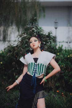 Fashionable portrait of a woman posing outdoors in Bandung, Indonesia, showcasing unique style and elegance.