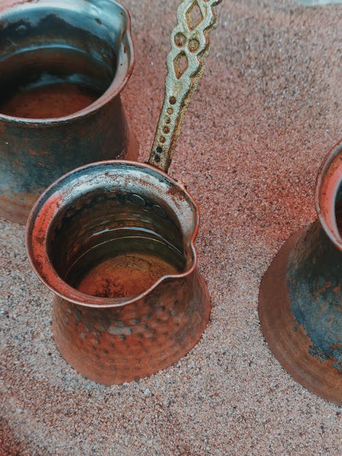 Gray Iron Cast Cups Close-up Photography