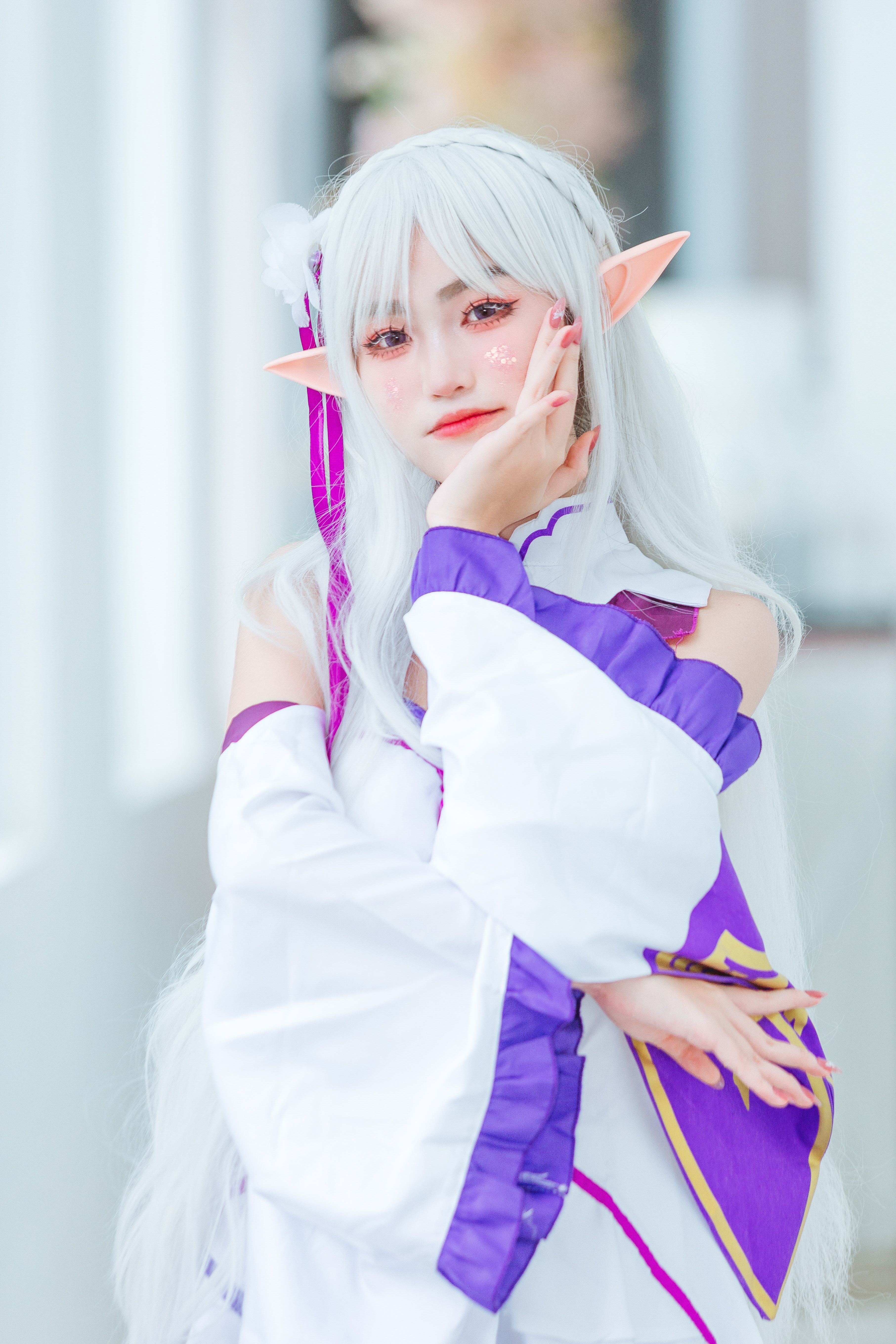 A girl in a white and purple costume