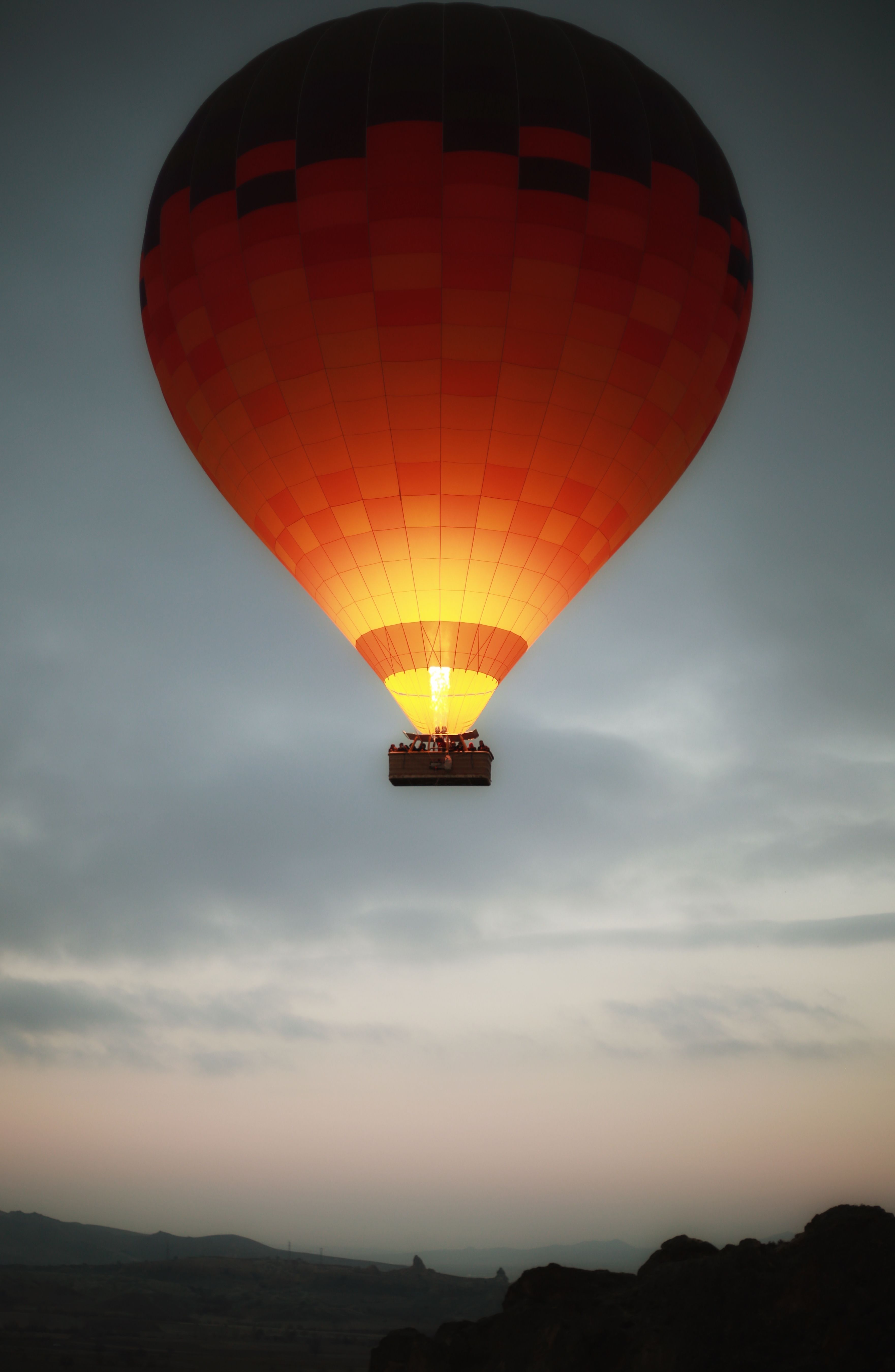 A hot air balloon is flying in the sky · Free Stock Photo