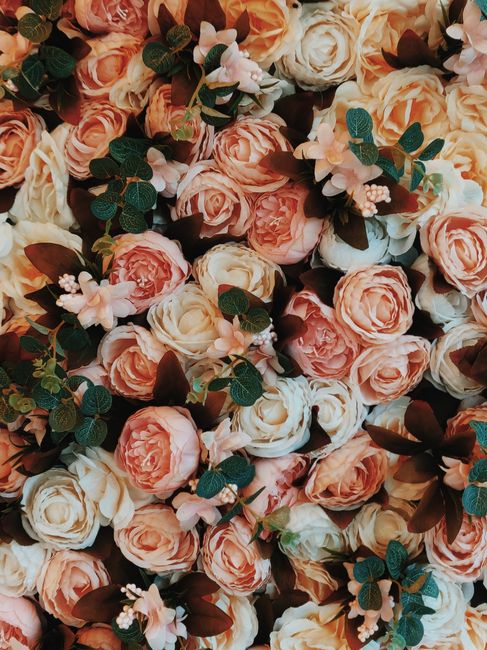 Luxurious display of pink and white roses in full bloom, perfect for romantic celebrations.