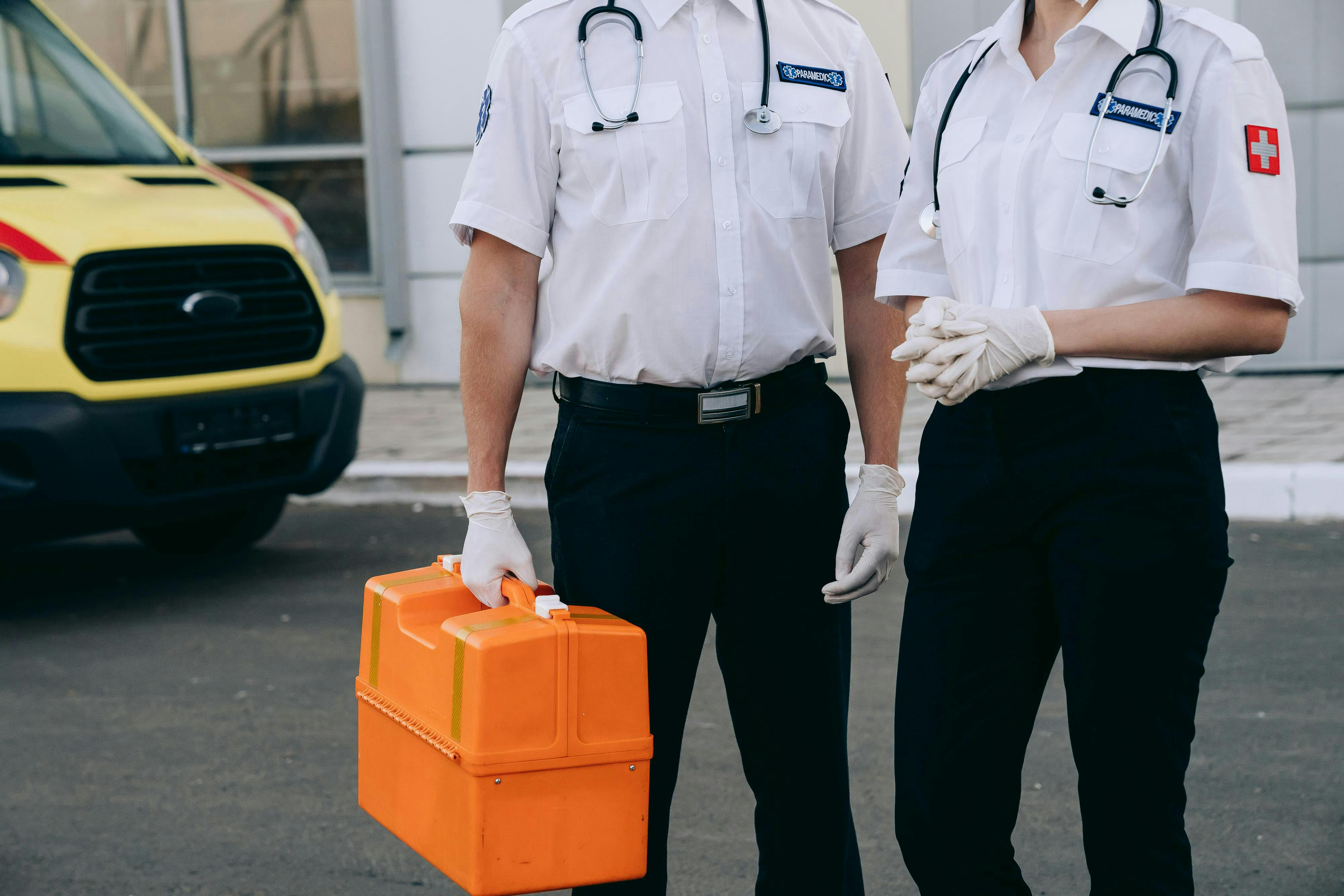 paramedic in medical gloves