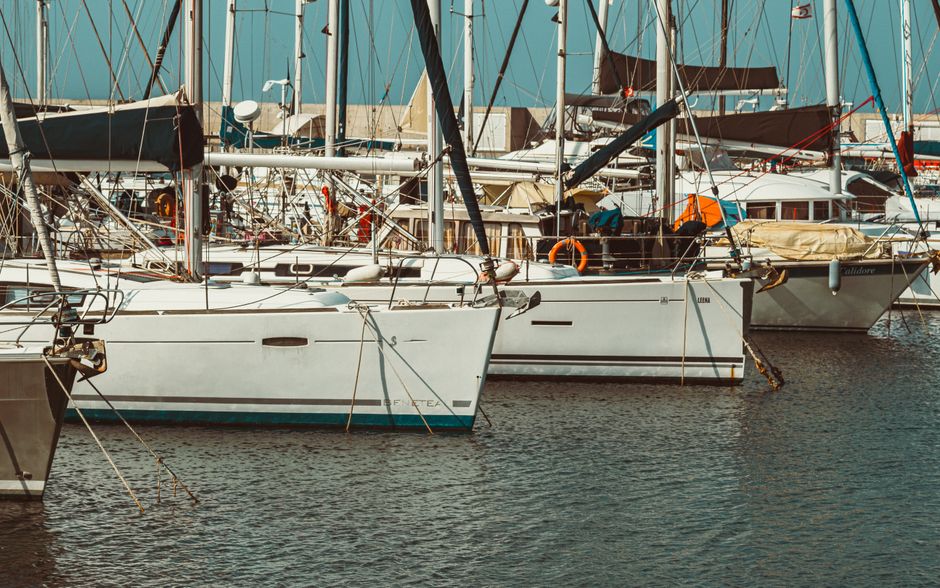 Best Full-Day Private Sailing Adventure in Malta and Gozo Review: 8 Hours of Mediterranean Bliss Review 2026 - A tranquil marina with luxury yachts and sailboats under the clear blue sky.