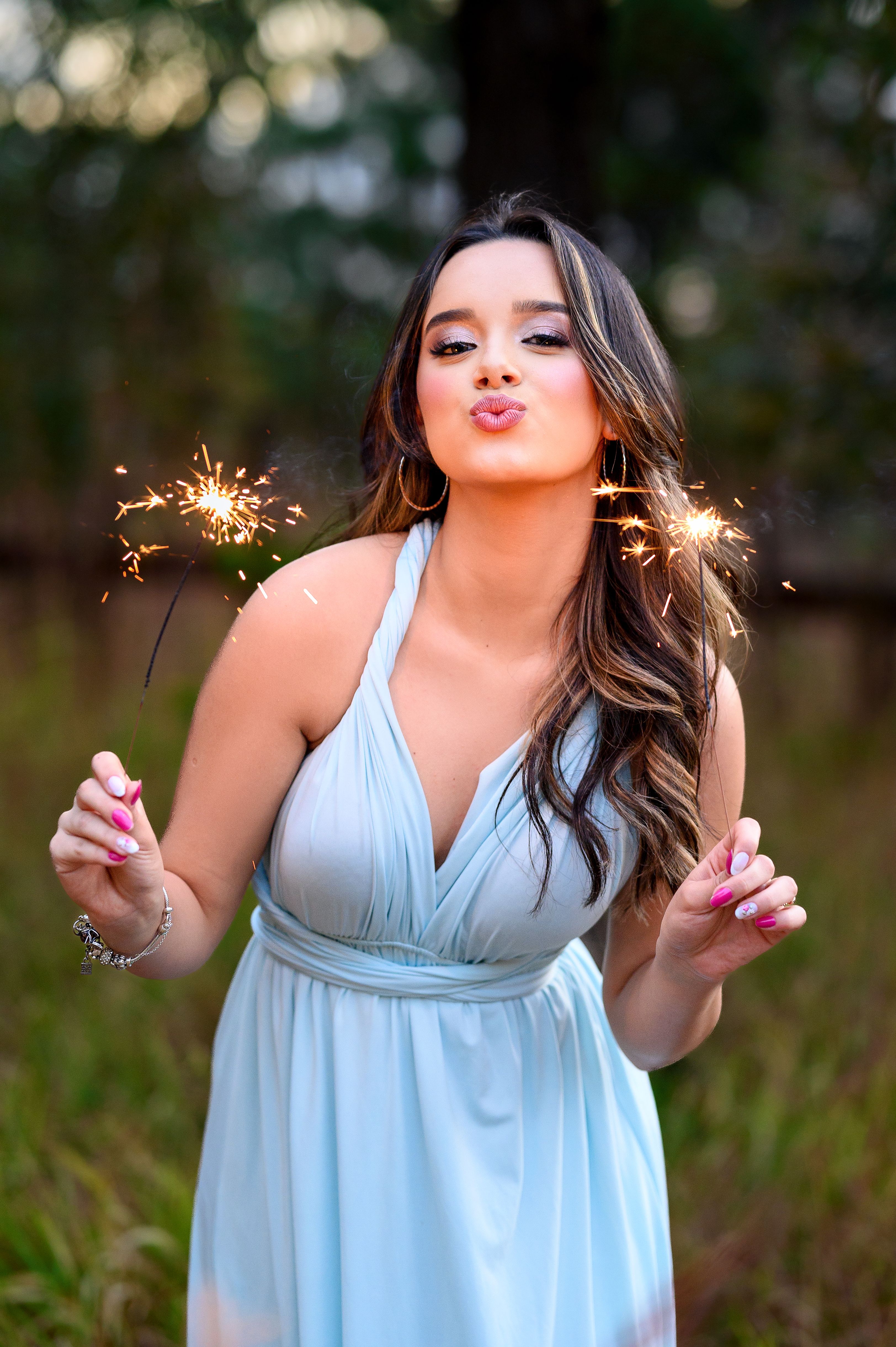 Woman with Two Firecrackers · Free Stock Photo