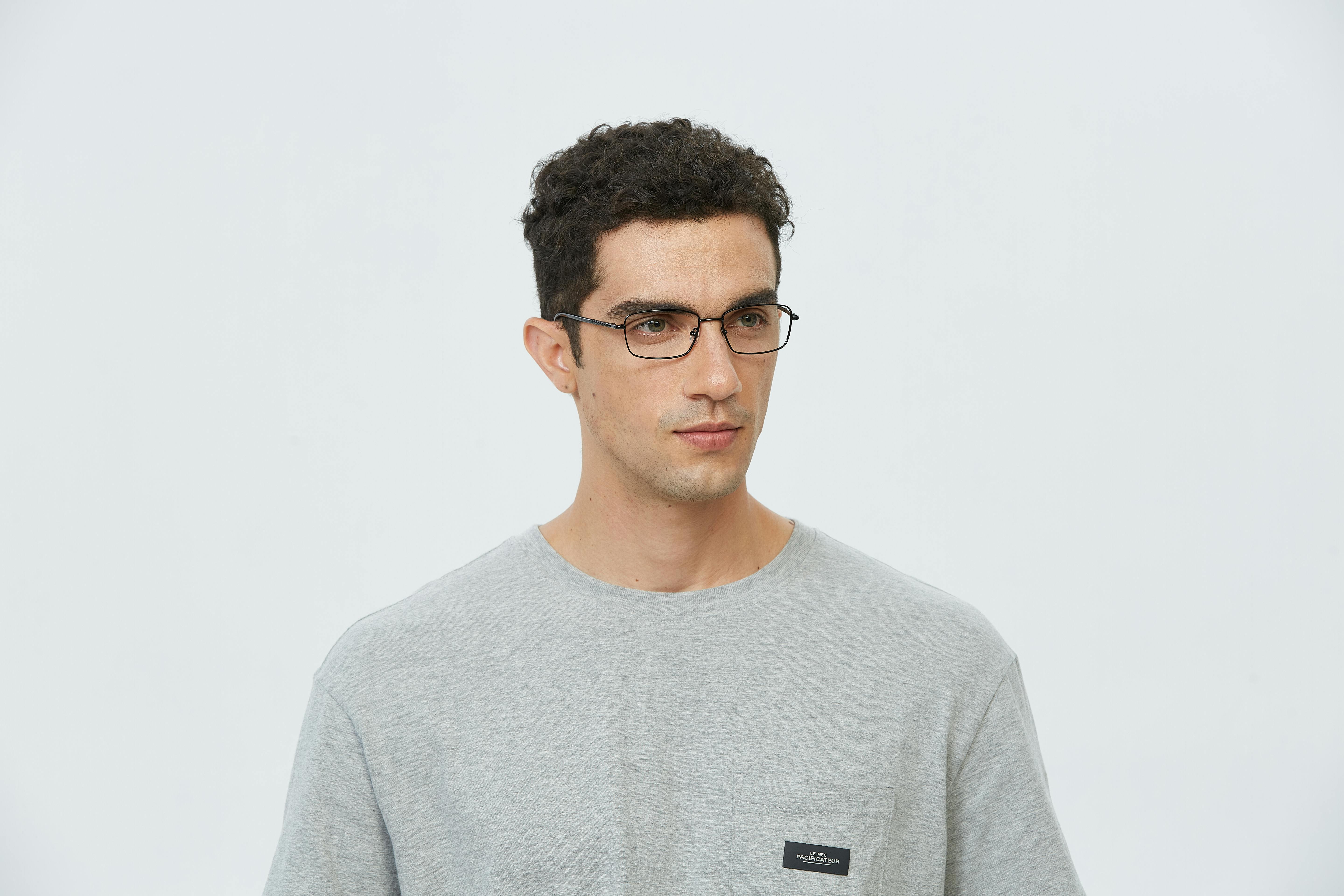 black glasses elevate gray shirt for stylish look