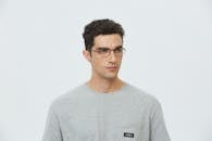 Black Glasses Elevate Gray Shirt for Stylish Look