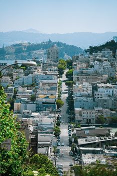 Discover a stunning aerial view of San Francisco's iconic hilly cityscape, highlighting its dense urban architecture.