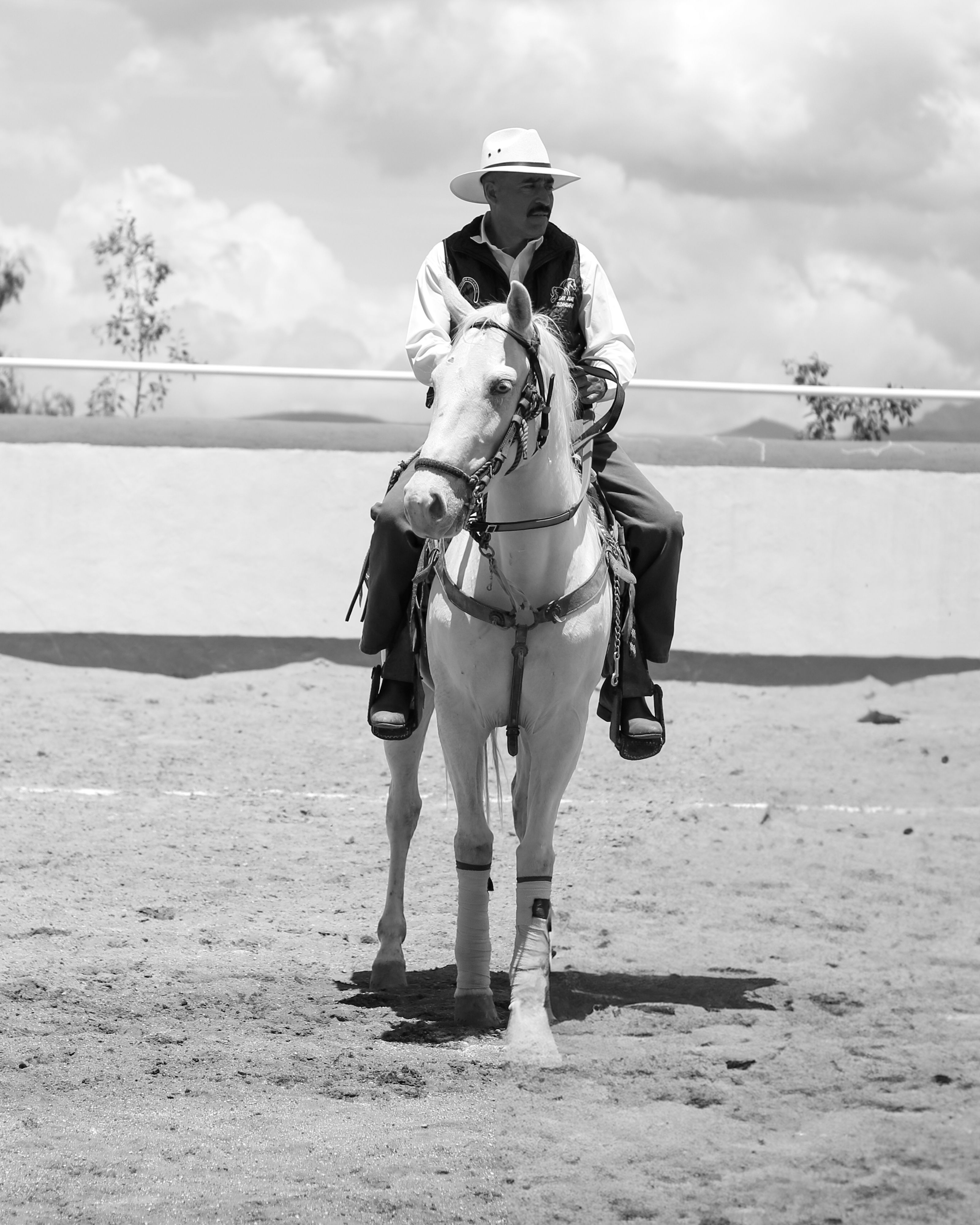 A charro performs equestrian skills on a horse in San Juan Tizahuapan, México.