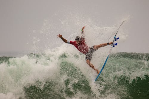 Free Surfboarding Man Stock Photo