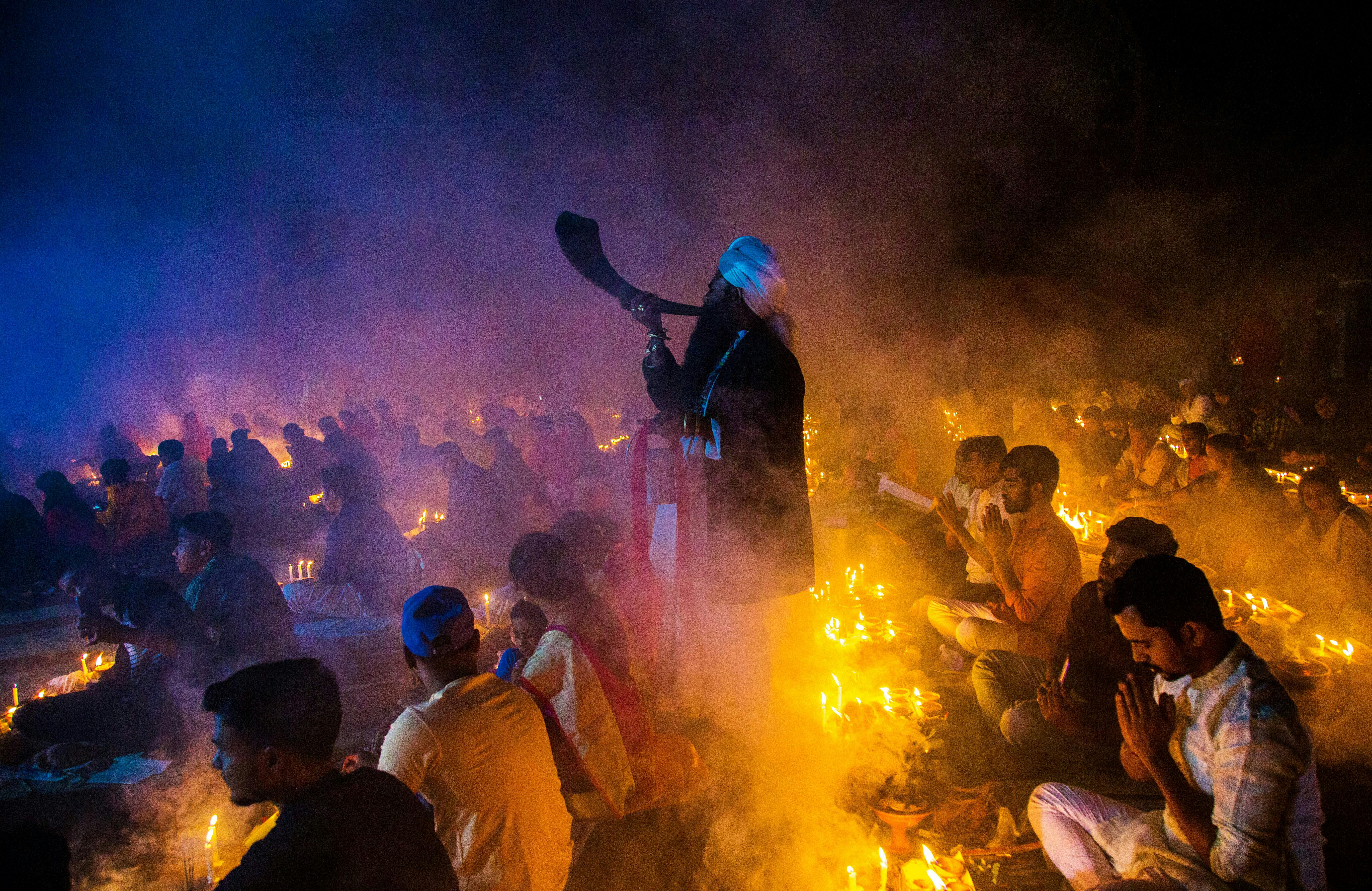 A calming candlelit environment surrounded by soft tones of warmth and relaxation.