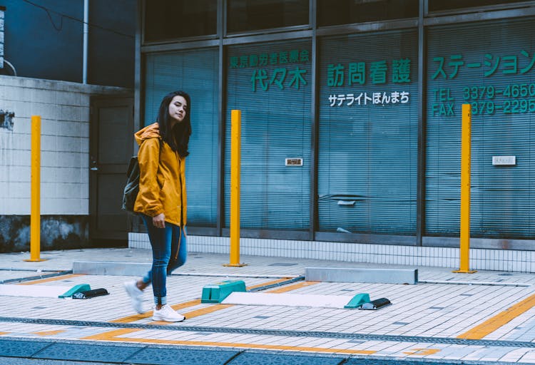 Photo Of Woman Wearing Yellow Jacket