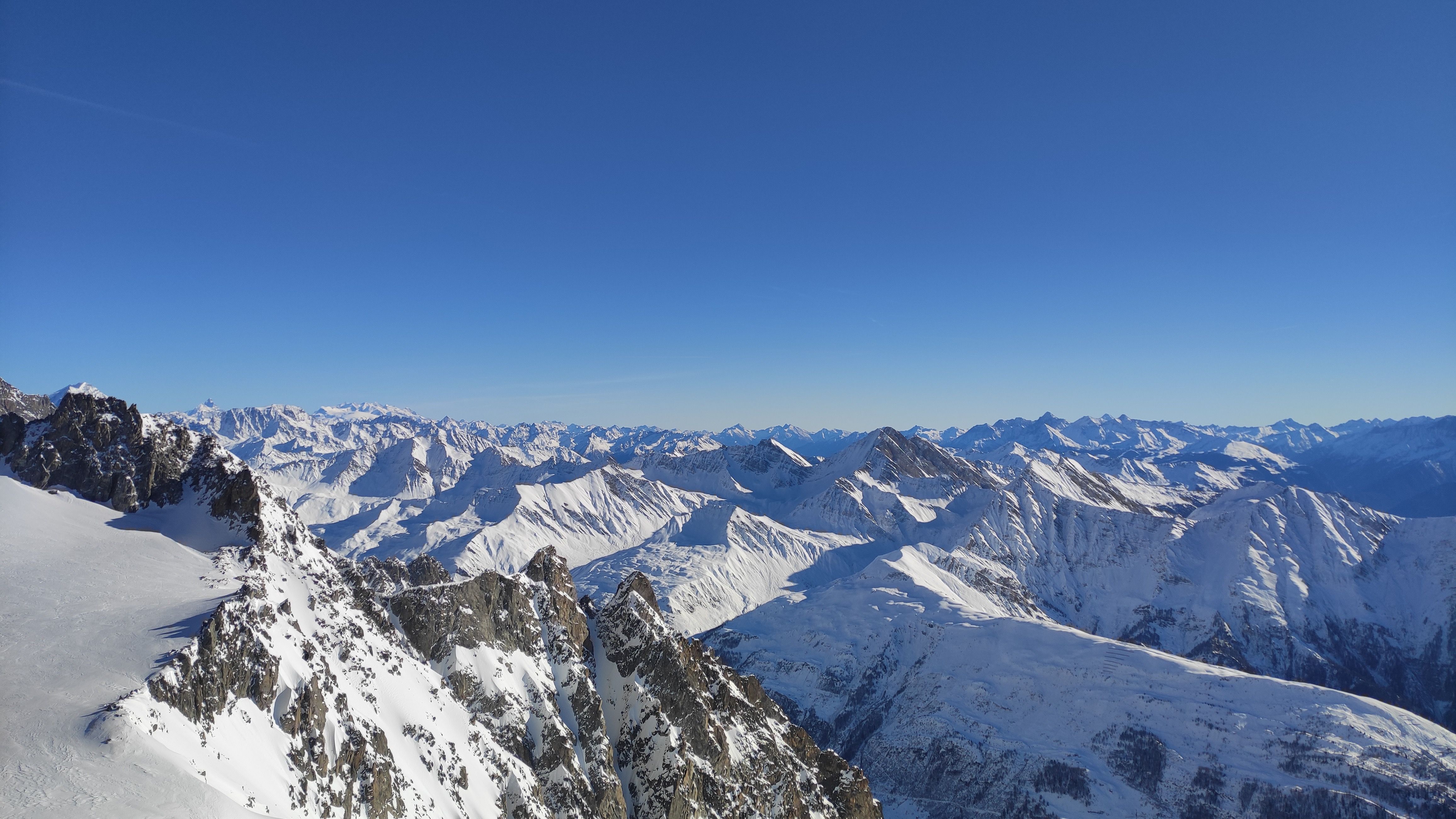 The snow-covered Alps from Mont Blanc, above the tunnel road into Italy
