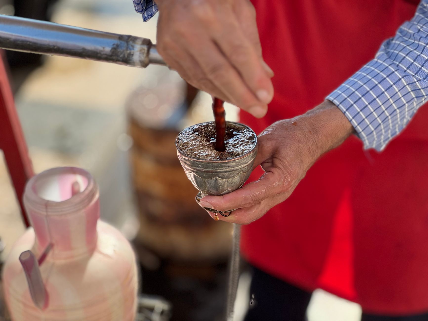Man preparing traditional coffee in Batman, Türkiye, showcasing artisanal skills. Man preparing traditional coffee in Batman, Türkiye, showcasing artisanal skills.