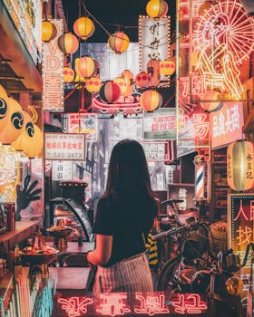 A mesmerizing view of a colorful Asian street filled with neon signs and lanterns, capturing urban nightlife ambiance.