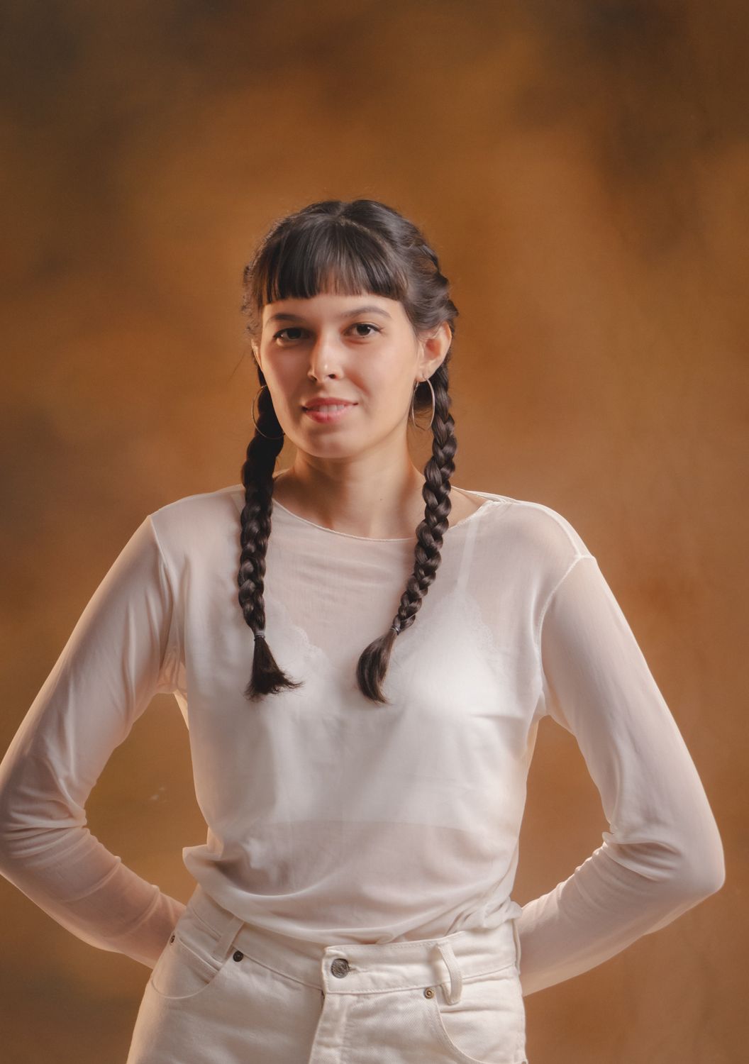 A woman with long hair and a white shirt · Free Stock Photo