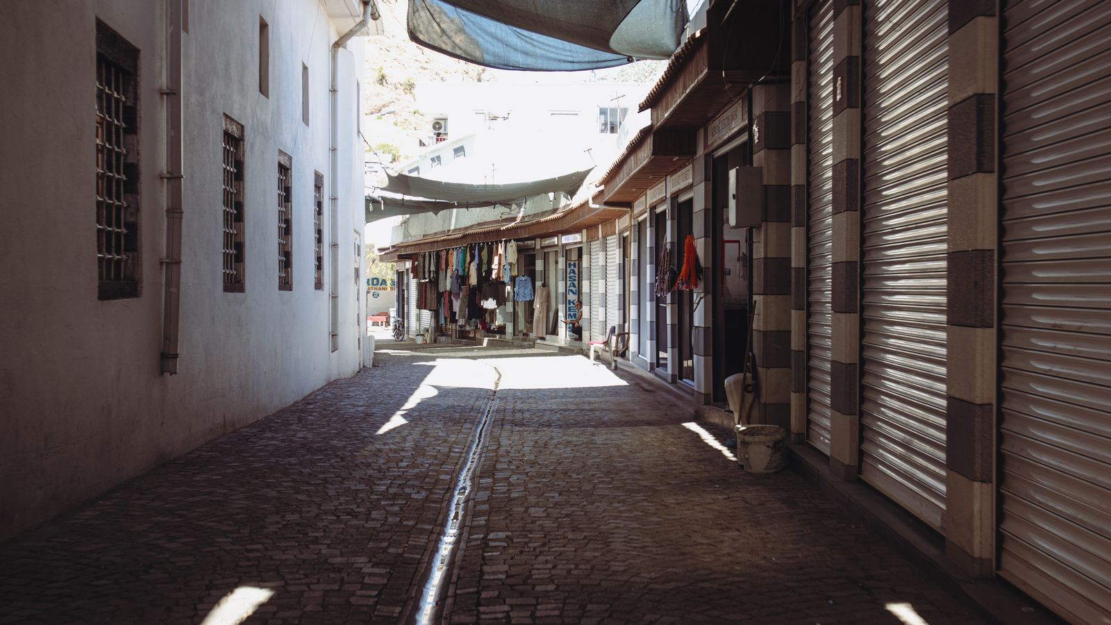 A narrow alley with a lot of shops and people, Cabo Verde