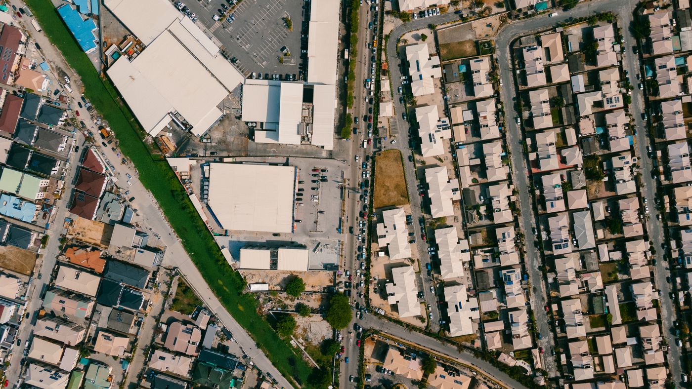 Aerial view of Lagos city with roads, housing, and dense urban development