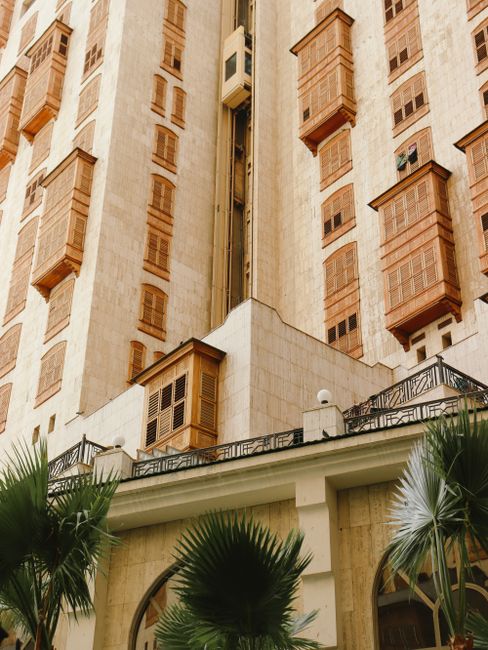 A stunning view of a traditional building's facade with wooden balconies, perfect for travel and architecture enthusiasts.