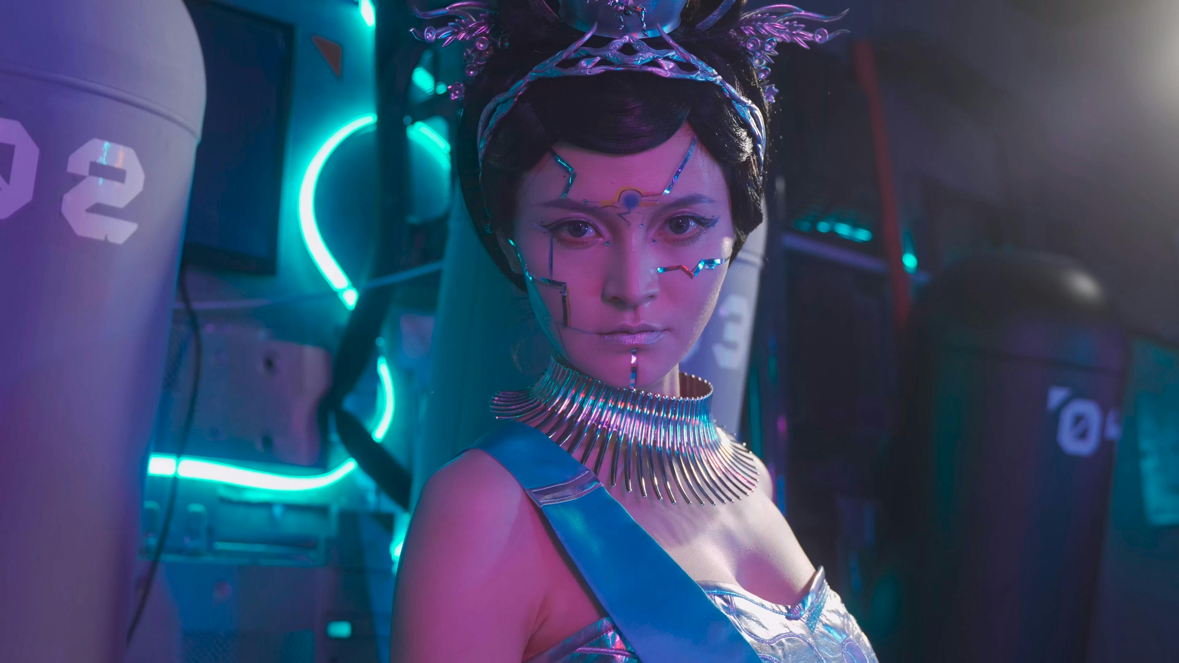 a woman in a costume with neon lights