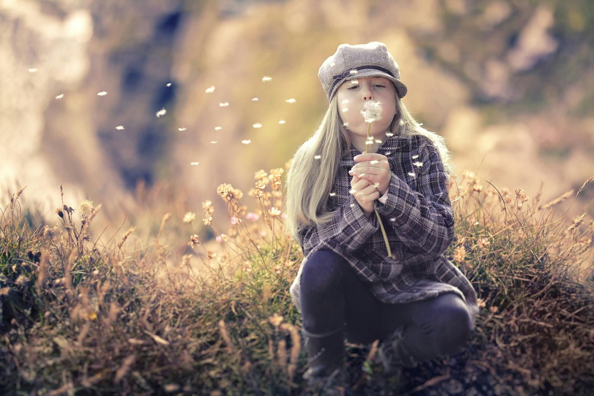 Girl Blowing Bubbles in Shallow Photo
