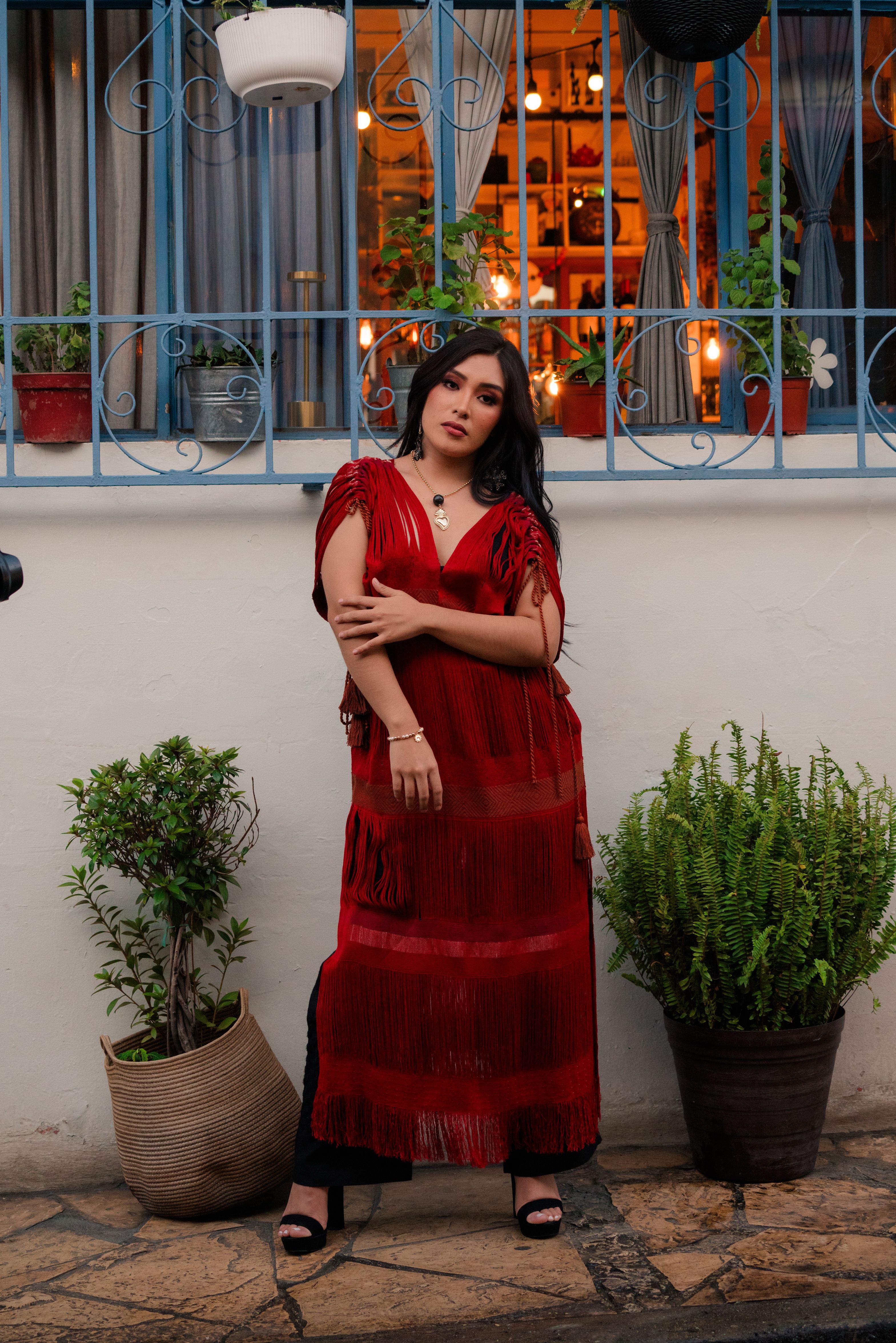 A woman in a red dress posing for a picture · Free Stock Photo