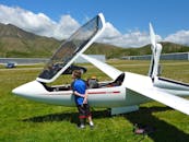 Man Standing in Front of the White Plane