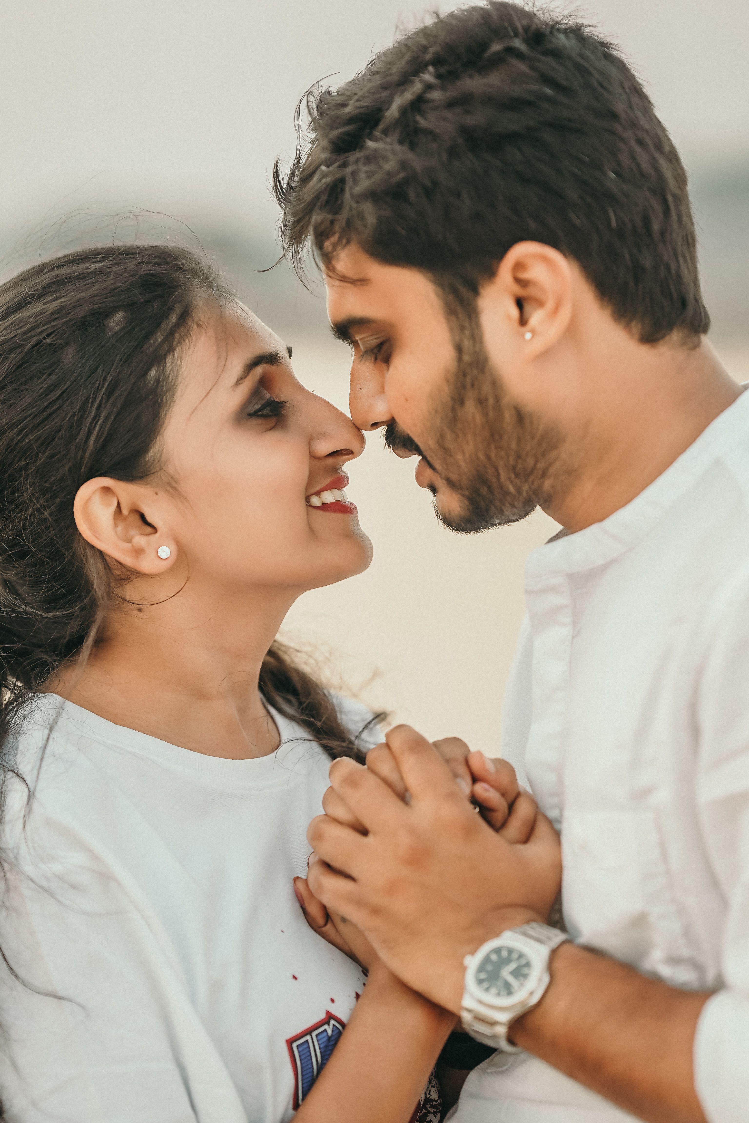 A loving couple sharing an intimate moment filled with affection and happiness.