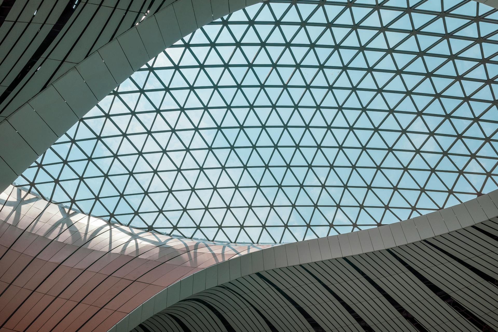 The roof of a building with a large glass dome