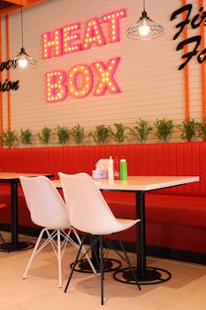 Contemporary restaurant interior in Islamabad with vibrant decor and seating.