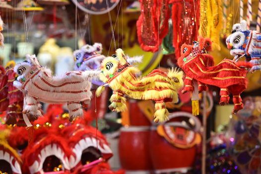 Colorful lion toys at a Hanoi festival, perfect for Mid-Autumn celebrations.