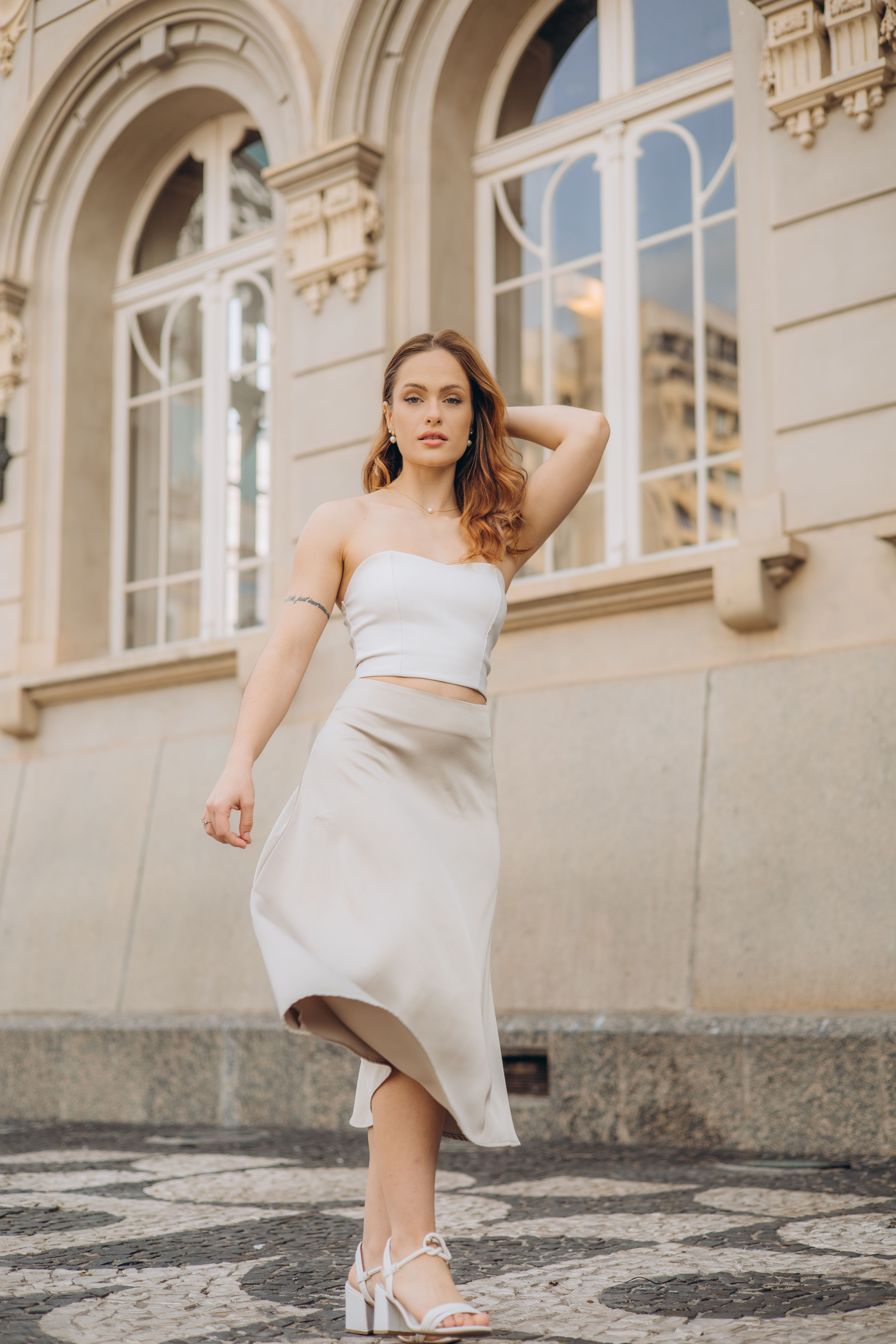 A woman in a white crop top and skirt · Free Stock Photo