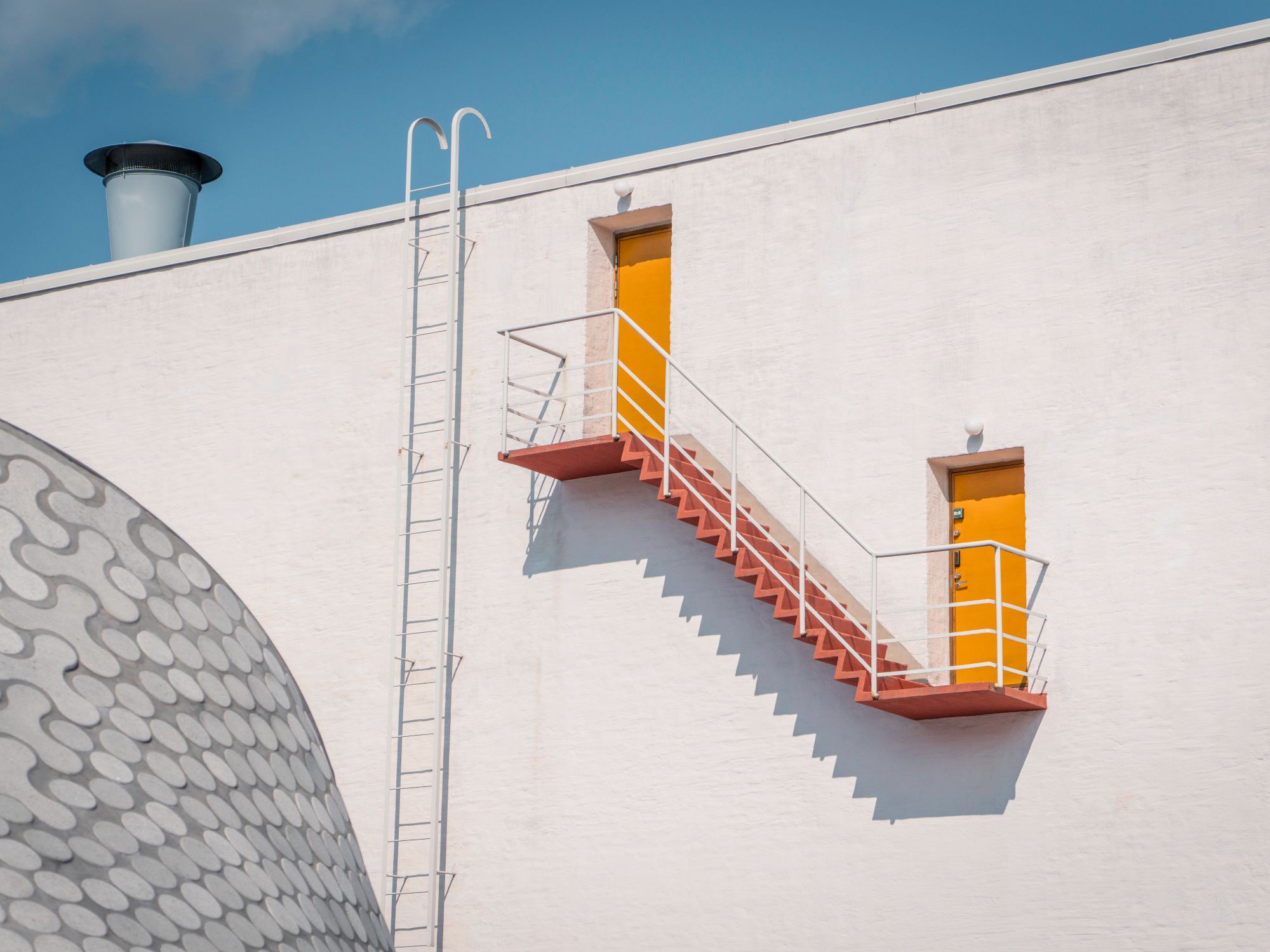 Painters & Decorators in Foots Cray, London — professional decorator painting a wall with a roller