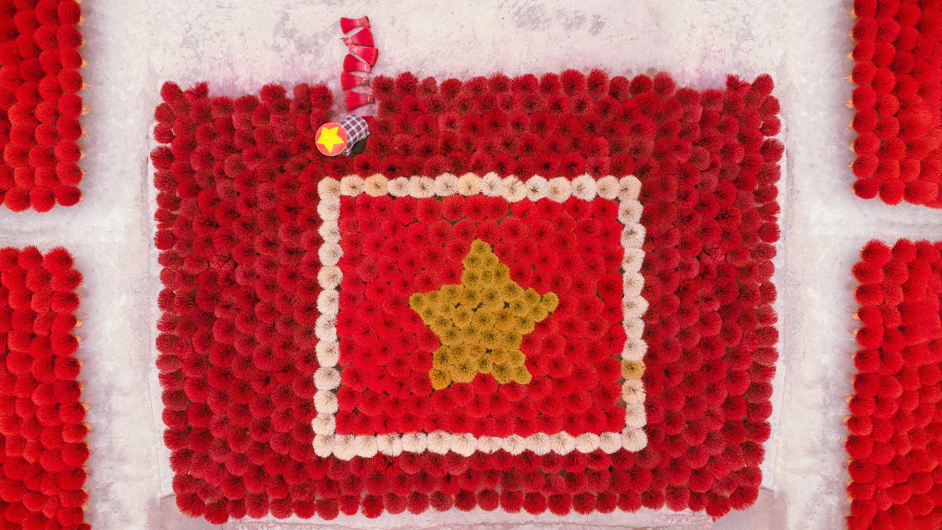A red and white flag with a star on it