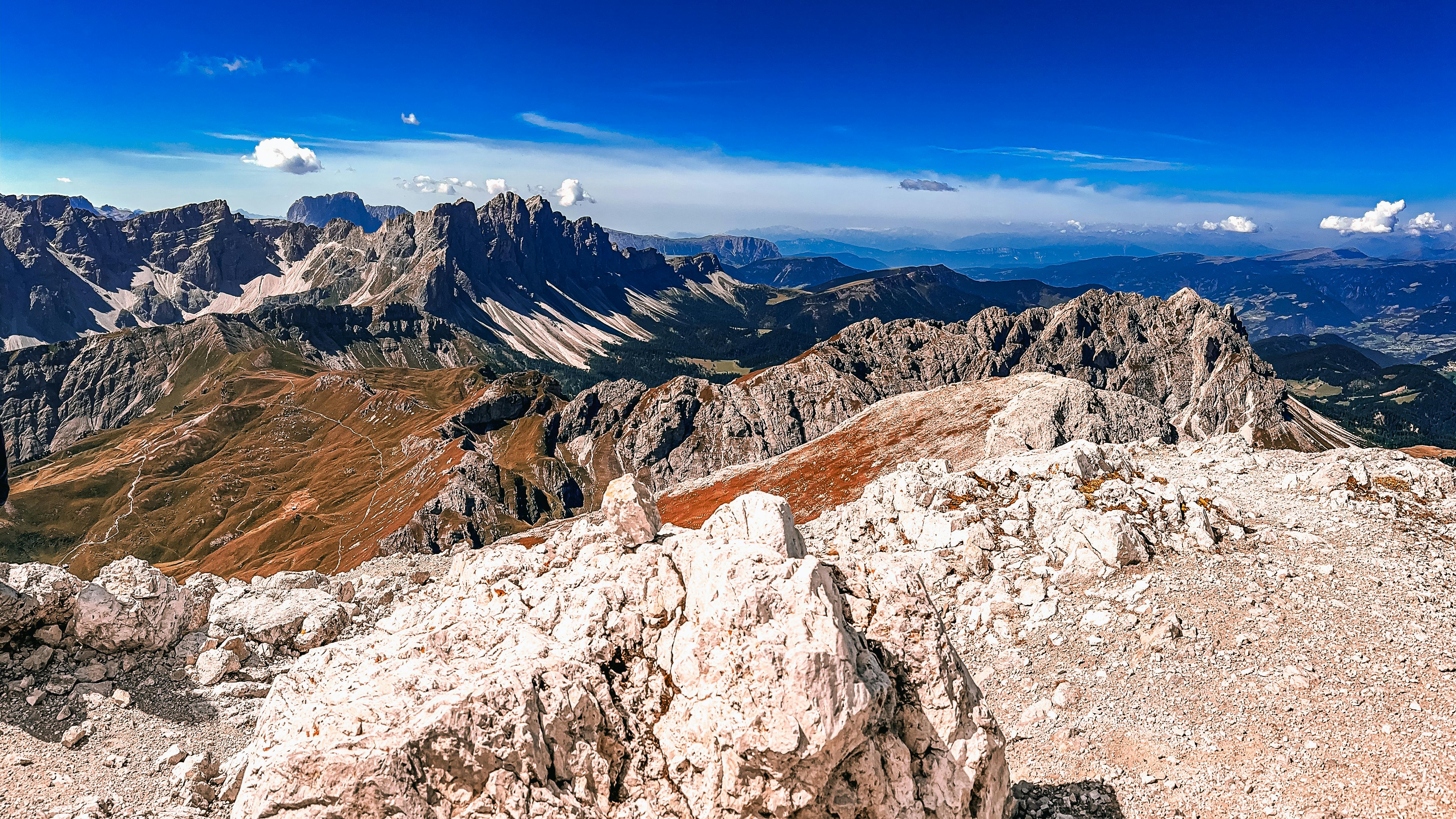Stunning rocky mountain range under a clear blue sky, perfect for adventure lovers and travel enthusiasts.