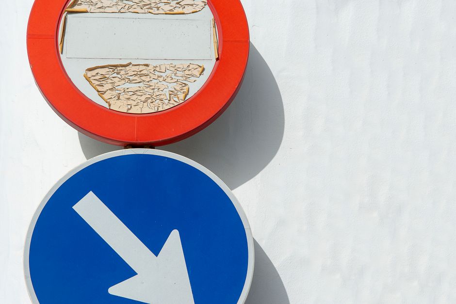 road signs multiple directions crossroads